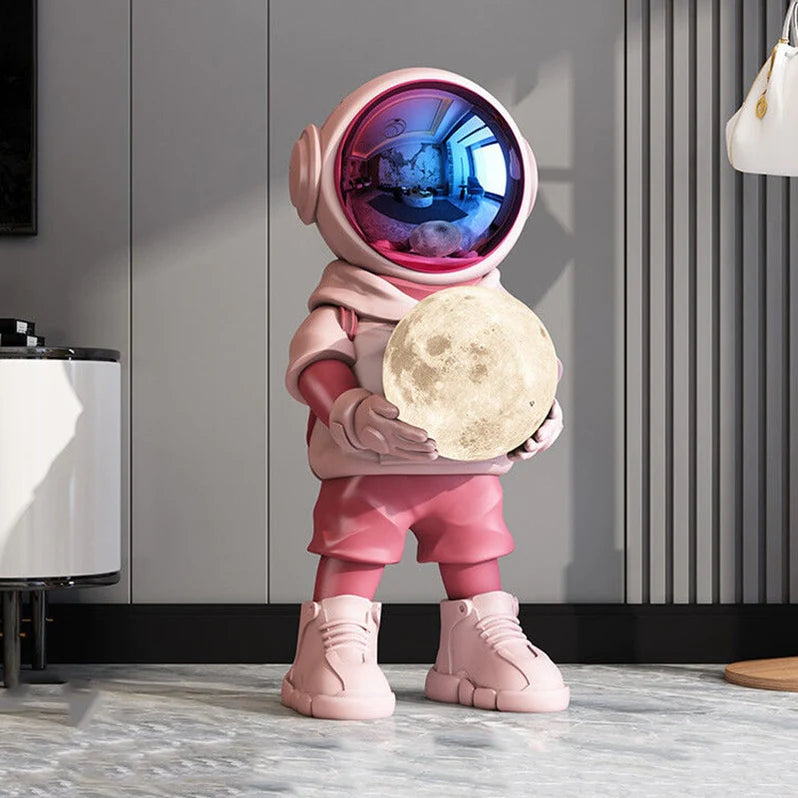 Astronaut Holding Moon Statue